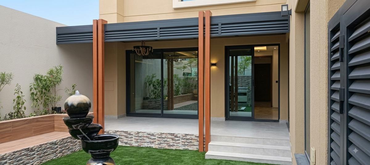 Canopy over entrance with copper posts