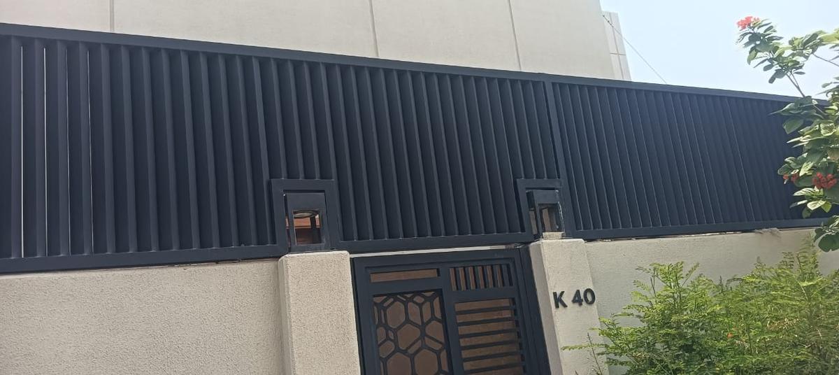 Louvered boundary fence and gate