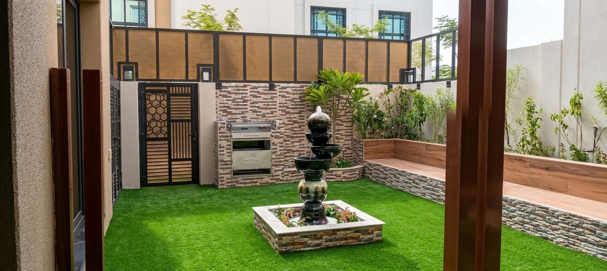 Villa backyard with laser-cut panel screen and fountain