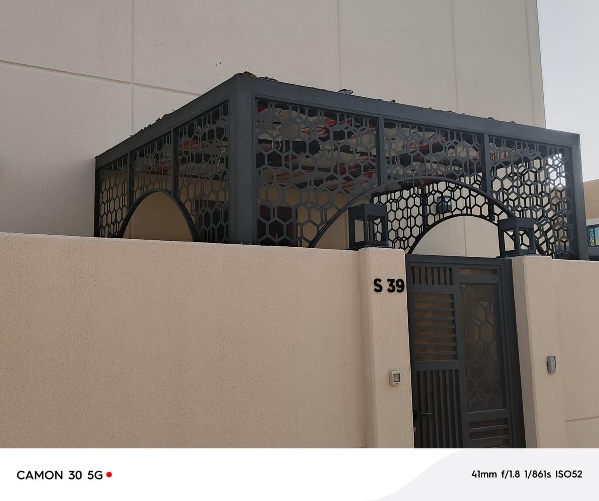 Laser cut canopy over villa entrance