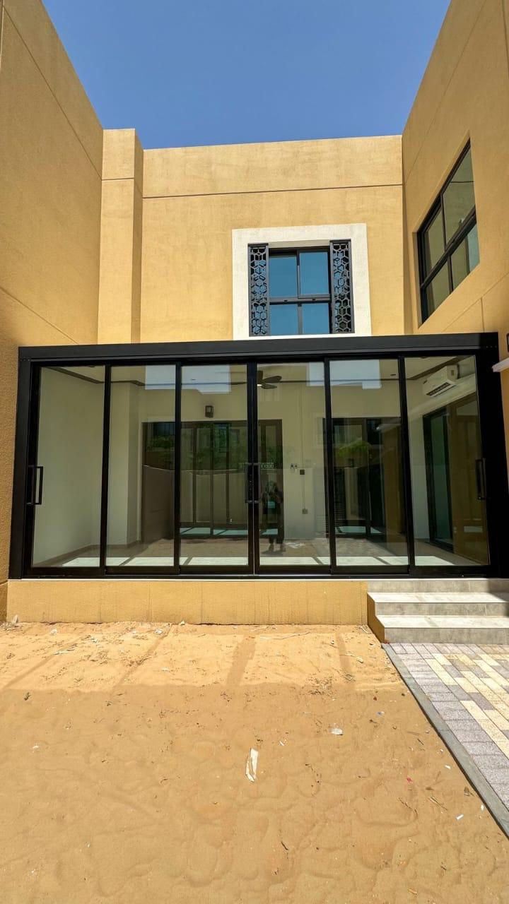 Aluminium framed glass corner extension