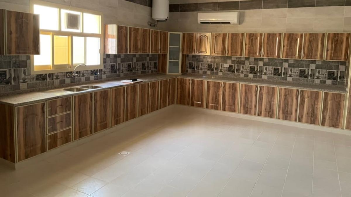 Wood finish kitchen by window